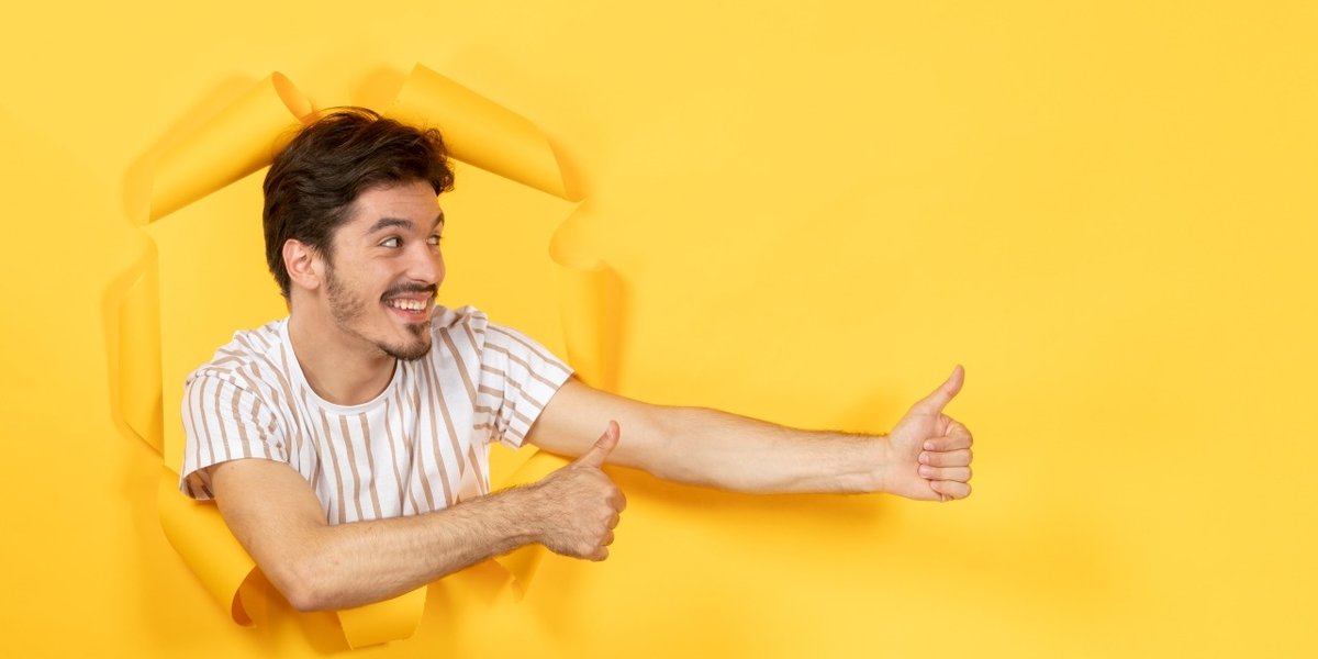 wp-0f508589891d3886-young-male-torn-yellow-paper-background-sale-facial-guy