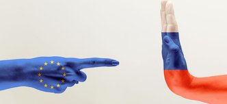 wp-114cf929b093a8cc-confrontation-countries-disagreement-female-male-hands-colored-flags-european-un