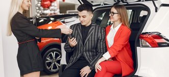 wp-1481198cced662a5-stylish-elegant-people-car-salon