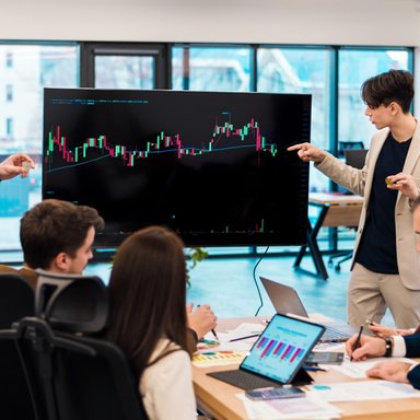 wp-2fb528ecd58958ac-two-young-worker-leading-business-meeting-about-cryptocurrencies-office