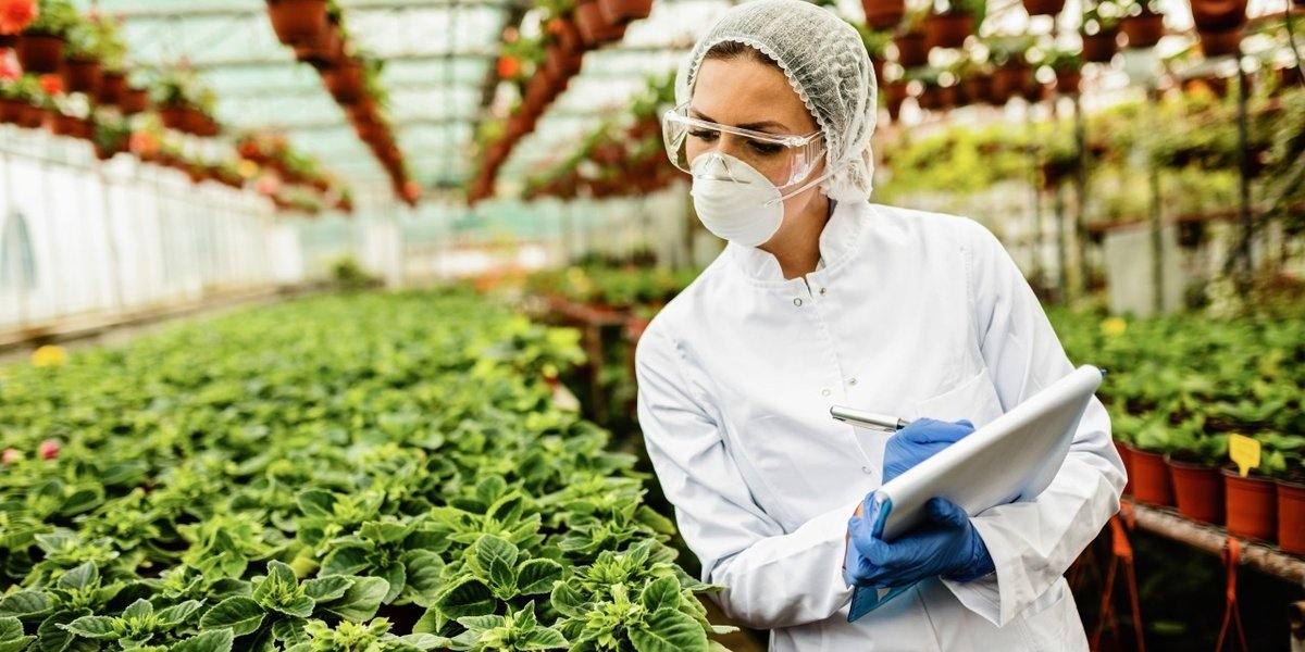 wp-4e4a13b921b4a415-female-scientist-writing-report-quality-control-inspection-plant-nursery
