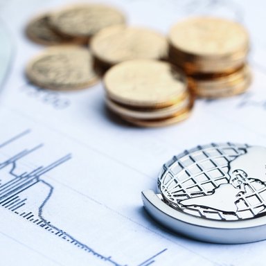 wp-5af023c8e54caaca-coins-paper-money-globe-white-statistic-form-background