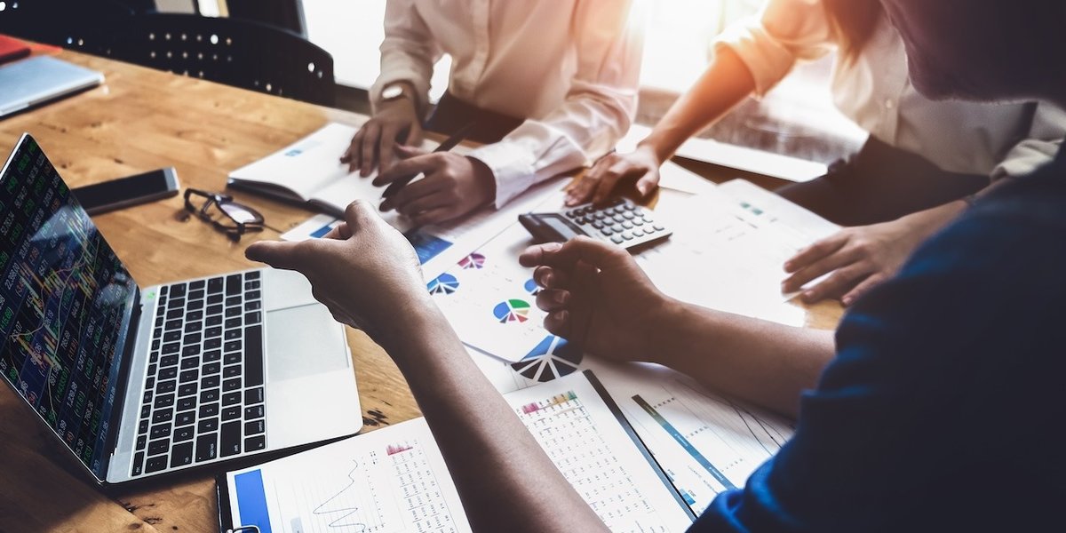 wp-6492d09cdae77be5-Business,Financial,,Accountant,Discussing,With,Partner,Are,Meeting,To,Audit