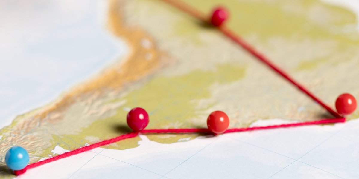 wp-732fc491bc22f100-concept-communication-with-pins-map