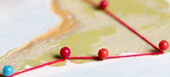 wp-732fc491bc22f100-concept-communication-with-pins-map