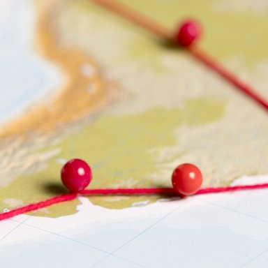 wp-732fc491bc22f100-concept-communication-with-pins-map