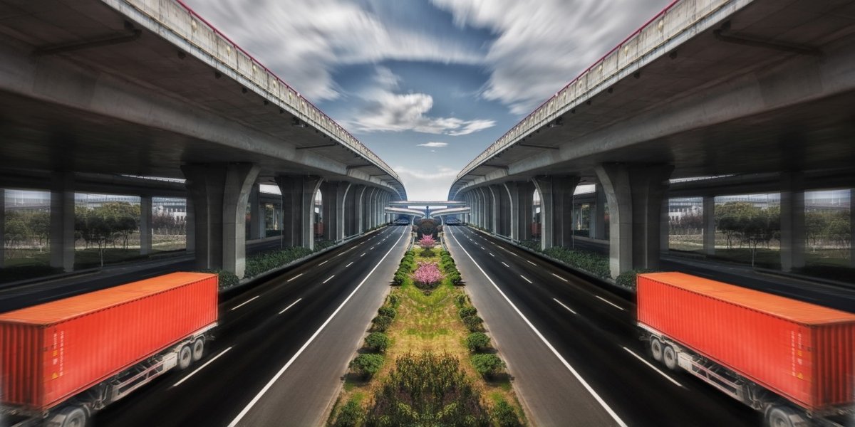 wp-7570371409b7bb7f-orange-trucks-road