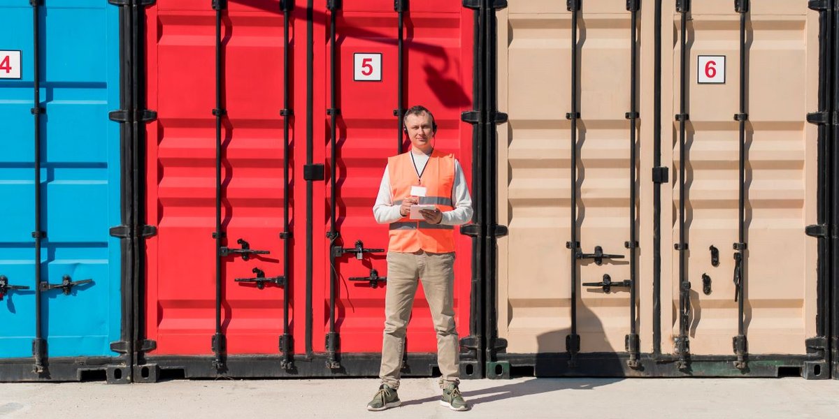 wp-94220880849347a9-full-shot-man-near-storage-units