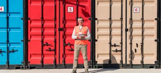 wp-94220880849347a9-full-shot-man-near-storage-units