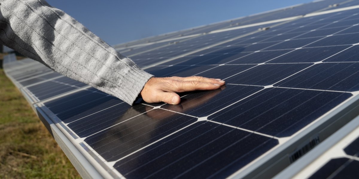 wp-b47759fa04d66c09-person-near-alternative-energy-plant