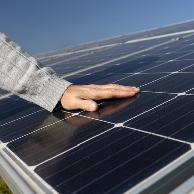 wp-b47759fa04d66c09-person-near-alternative-energy-plant