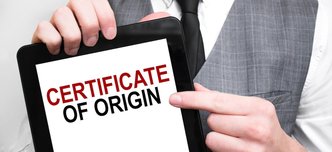 wp-d6561e62ed3c8d48-Businessman,Showing,Business,Concept,On,Tablet,Standing,In,Office,Certificate