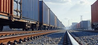 wp-dd8ad7f909e3e62d-freight-train-tracks-cloudy-blue-sky