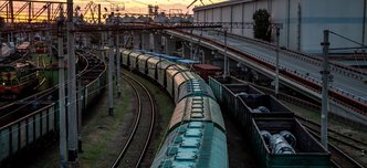 wp-e30188c85293ff12-view-from-railway-bridge-freight-trains-sunset