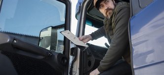 wp-ec4f0e136c123fea-low-angle-man-sitting-truck