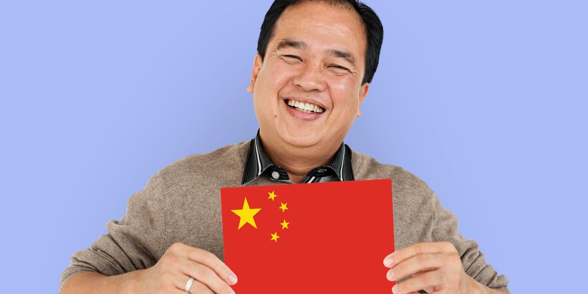 wp-ec9d2710e3140329-man-hands-hold-china-flag-patriotism